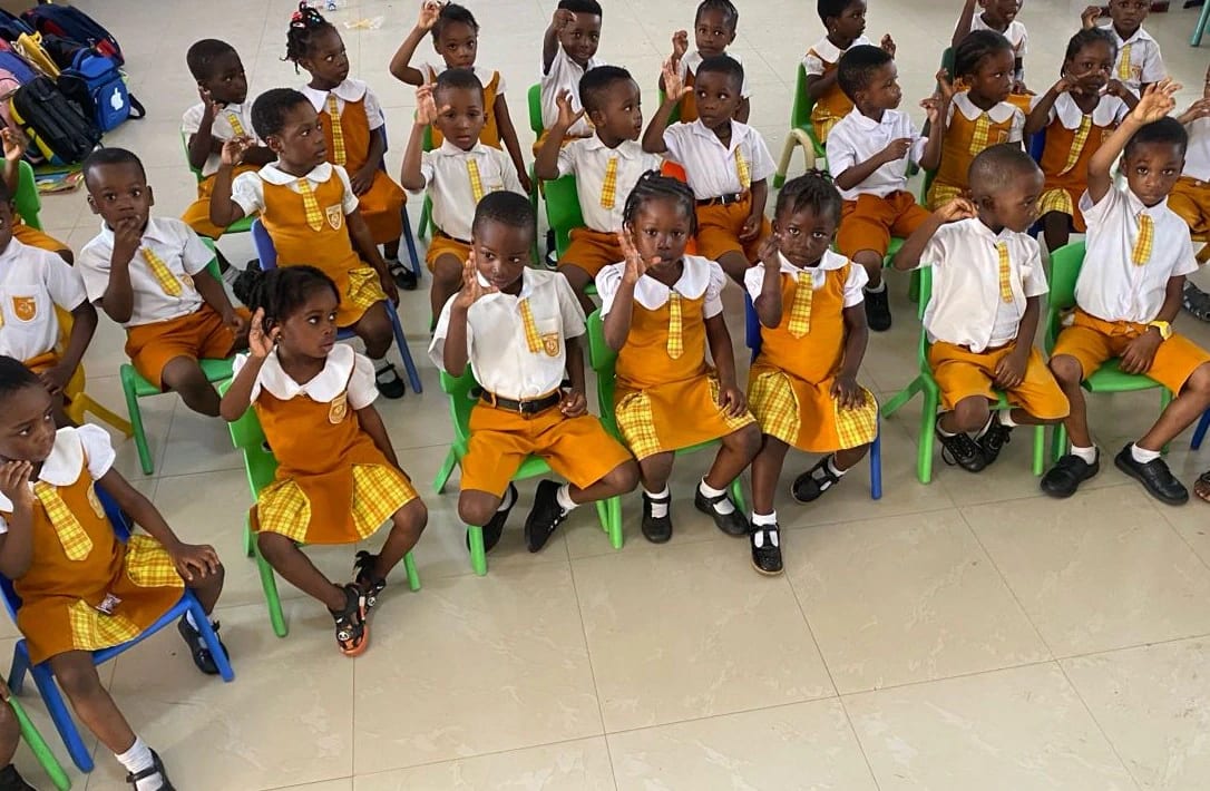 Divine International School pupils during signing and expression.